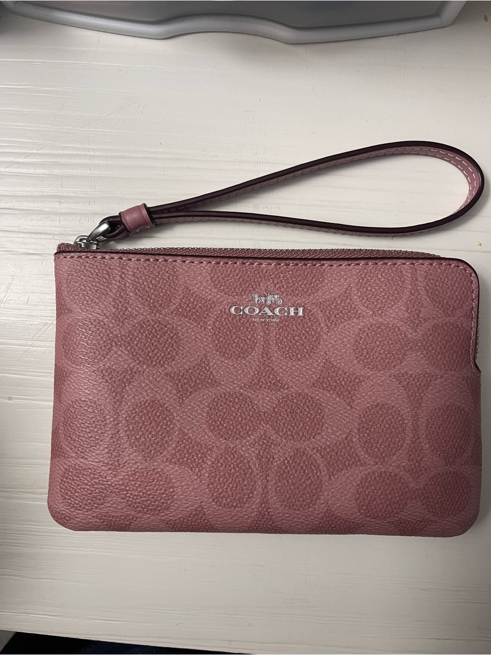 COACH Signature Wristlet in Dusty Pink